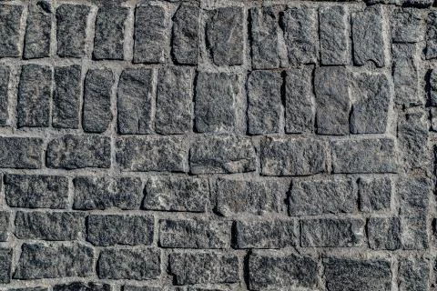 Old paving stone mosaic pattern. Pavement texture Stock Photos