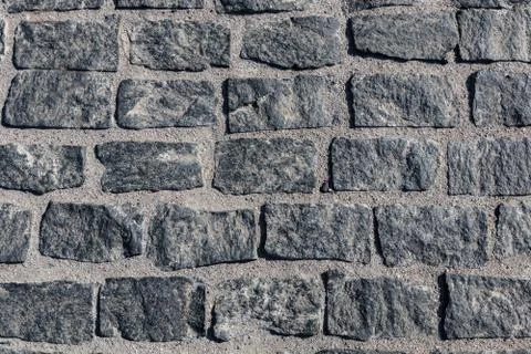 Old paving stone texture. Coddlestone sidewalk top Stock Photos