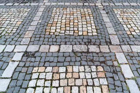 Old paving stones pattern. Texture of ancient german cobblestone in city down Foto stock