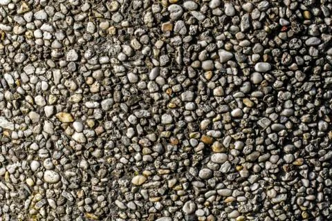 Old pebble stone wall pattern closeup Stock Photos