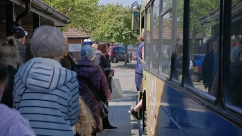 Old people, pensioners using public transport bus. Hull.UK.6.7.2024 Stock Footage 280394322