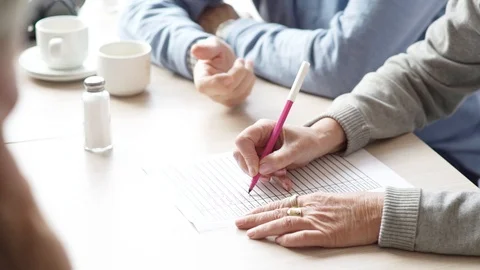 Old people playing game Stock Footage 89693153