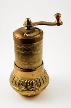 Old pepper mill on white background Stock Photos