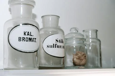 Old pharmacy jars which used to be used for medicines - rose Stock Photos