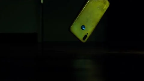 OLD PHONE DROPPING ONTO FLOOR A Video stock 230142314