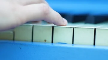 Old piano right hand close up Stock Footage 86141076