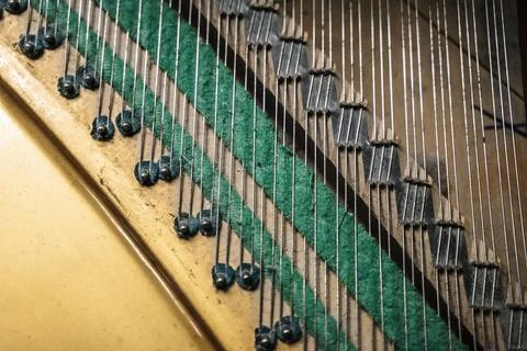 Old piano strings close up. Stringed musical instrument, sound, tuning, music Stock Photos
