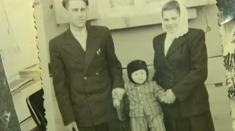 Old pictures in the hands of the elders Stock Footage 25423569