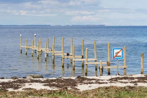 Old pier in Denmark Stock Photos