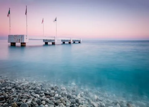 Old pier in the sea. Stock Photos