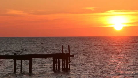 Old pier in sunset Stock Footage 123699514