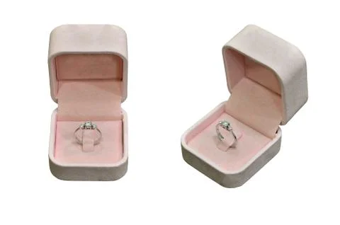 Old pink box with diamond ring Stock Photos