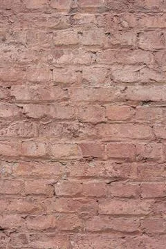 Old pink bricks wall background, vertical image Foto stock