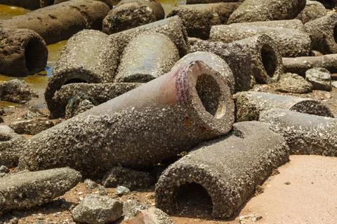 Old pipe on beach Stock Photos