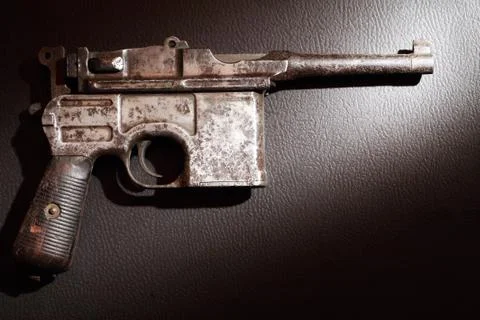 Old Pistol On Dark Stock Photos
