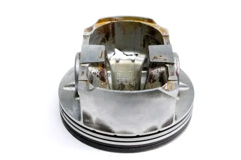 Old piston on white background Stock Photos