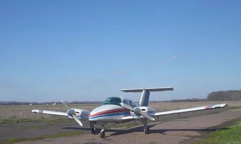 Old plane with two piston engines and propellers Stock Photos