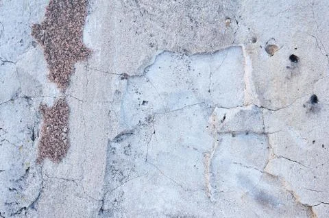 Old plaster wall, chipped paint, landscape style, gray texture, background Stock Photos