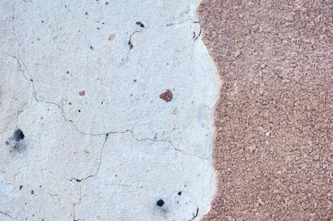 Old plaster wall, chipped paint, landscape style, gray texture, background Stock Photos