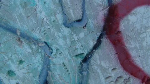 Old plaster wall is painted in different bright colors Stock Photos