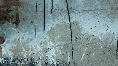 Old plaster wall is painted in different bright colors Stock Photos