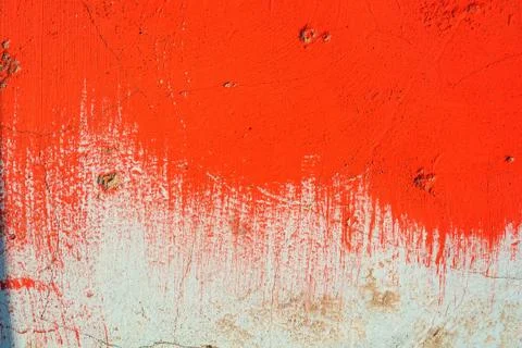 Old plaster wall partly covered in red paint Stock Photos
