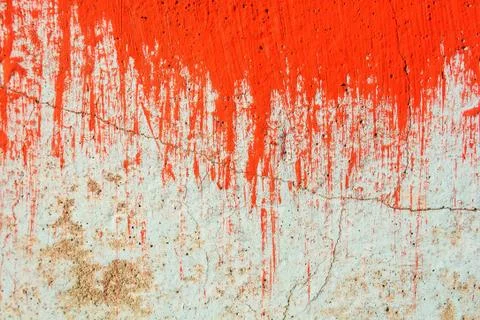 Old plaster wall partly covered in red paint Stock Photos