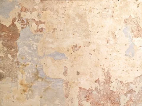 Old plaster wall showing peeling paint texture Stock Photos