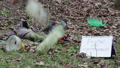 Old plastic bottles fall on a forest glade with garbage, the concept of taki 스톡 동영상 236191073
