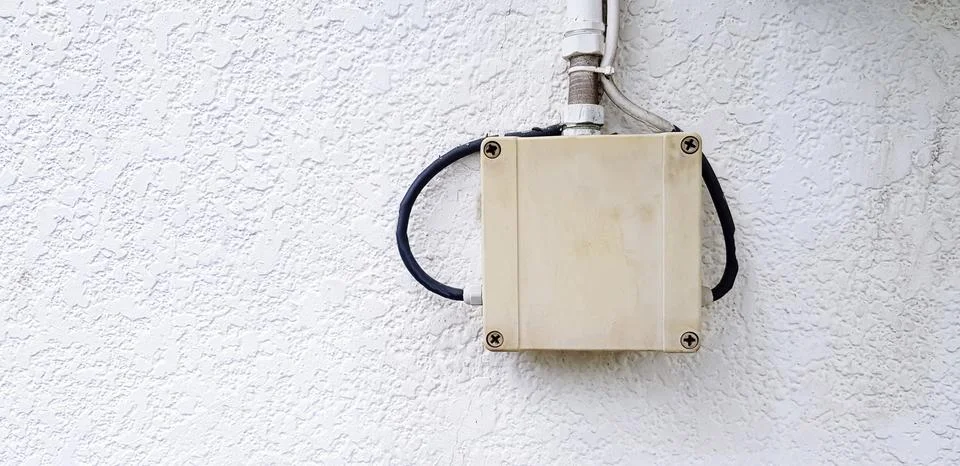 Old Plastic junction box for connect signal  cable or telephone line and pipe Stock Photos