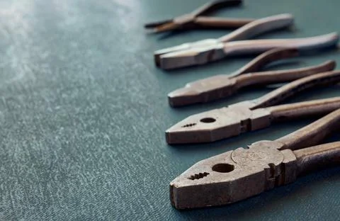 Old pliers close up, shallow depth of sharpness Stock Photos