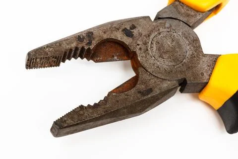 Old pliers on white background Foto stock