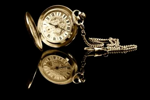 Old pocket watch with reflection Stock Photos