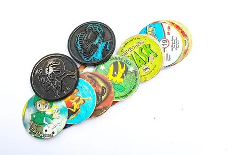 Old Pogs. A big pile of old playing children chips. Good game Stock Photos