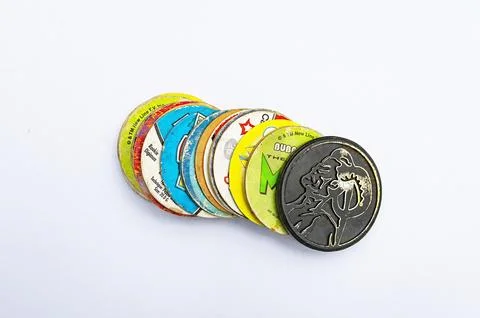 Old Pogs. A big pile of old playing children chips. Good game Stock Photos