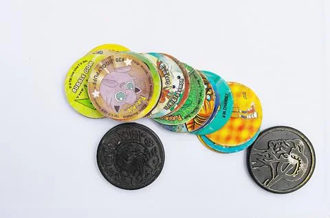 Old Pogs. A big pile of old playing children chips. Good game Foto stock