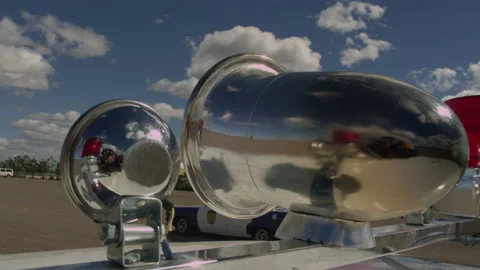Old police car siren during a chase, rotating and blinking during the day. Stock Footage