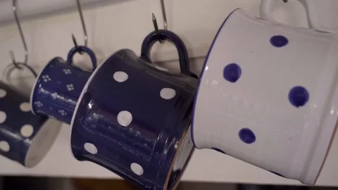 Old polka dot ceramic mugs Vídeo Stock 95001357