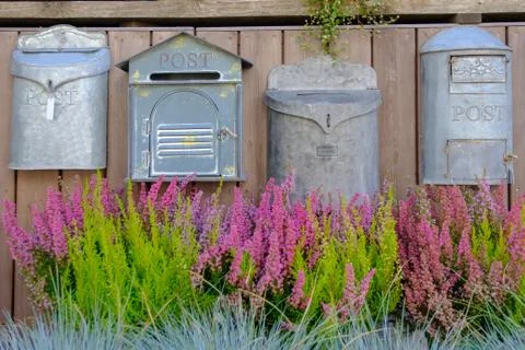 Old post boxes on the wall. Stock Photos