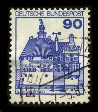Old postage stamp on a black background. Stock-Fotos