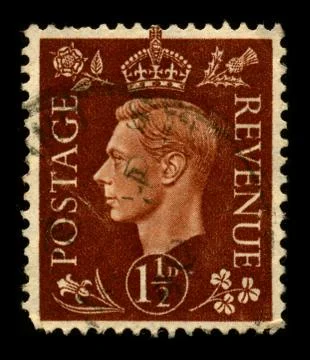 Old postage stamp on a black background. Foto stock