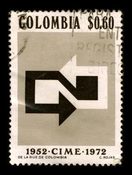 Old postage stamp on a black background. 스톡 사진
