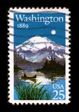 Old postage stamp on a black background. Foto stock