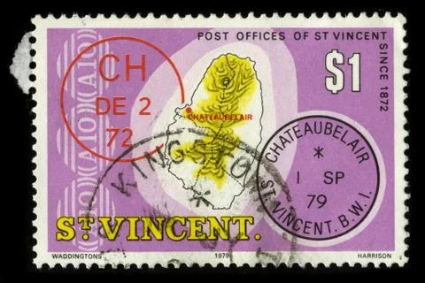 Old postage stamp on a black background. 스톡 사진