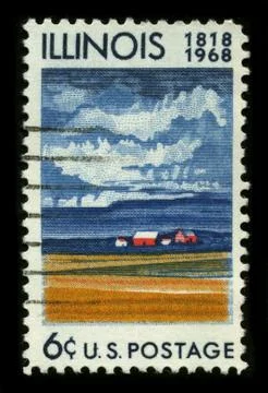 Old postage stamp on a black background. Stock Photos