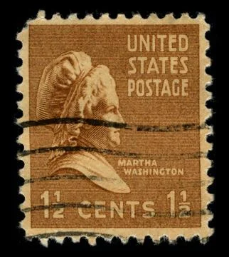 Old postage stamp on a black background. Foto stock