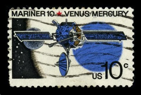 Old postage stamp on a black background. Stock Photos