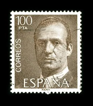 Old postage stamp on a black background. 스톡 사진