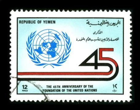 Old postage stamp on a black background. 스톡 사진