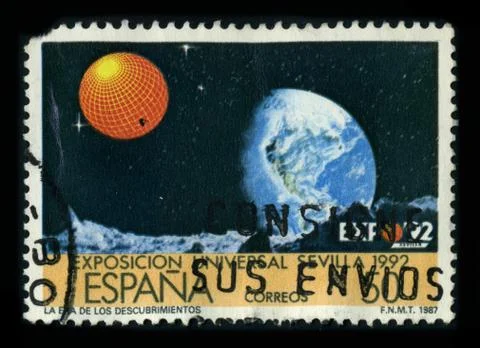 Old postage stamp on a black background. Photos